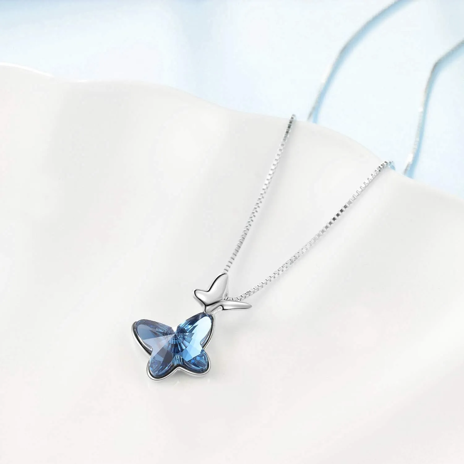 AOBOCO Sterling Silver Chasing Butterfly Pendant Necklace Embellished with Austrian Crystals - Fine Anniversary or Birthday Butterfly Jewelry Gift for Women - Morpho Helena Series