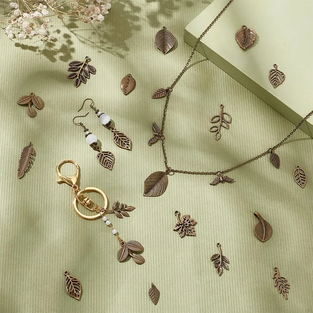 PH PandaHall 150pcs 15 Styles Tree Leaf Charms Pendants, Tibetan Branch Leaves Charms Metal Alloy Leaf Beads Antique Bronze Dangle Charm for Spring Earring Bracelet Necklace Kaychain Jewelry Making